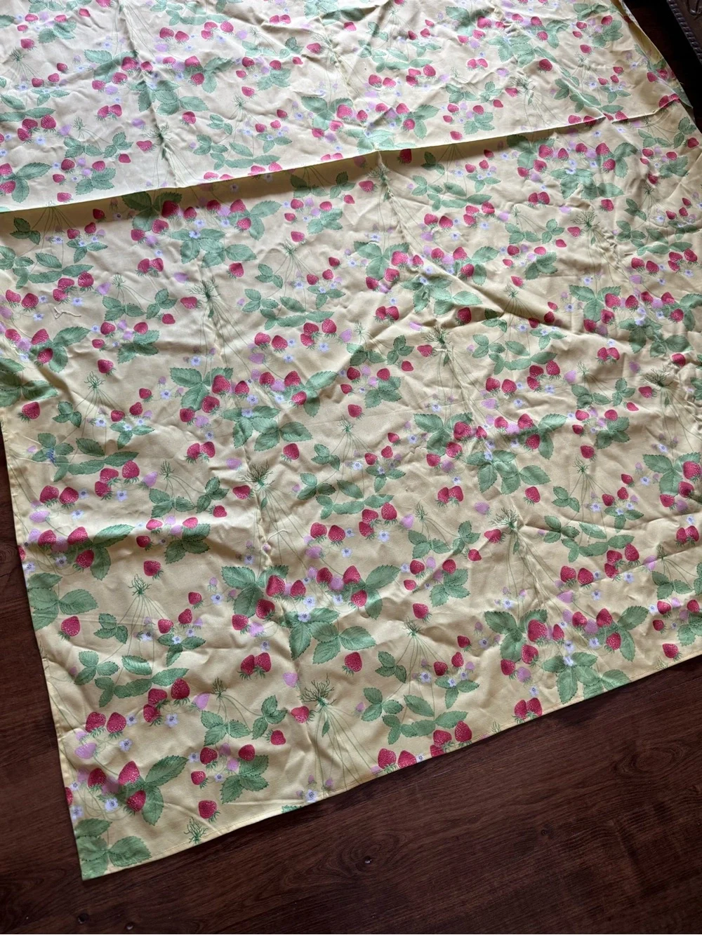 74” L X 52” W yellow with strawberries homemade tablecloth